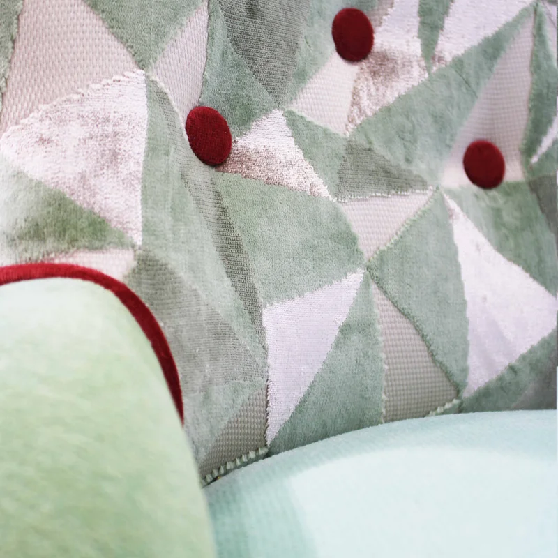 Teal velvetpatchwork armchair by MORETTINA DESIGN.